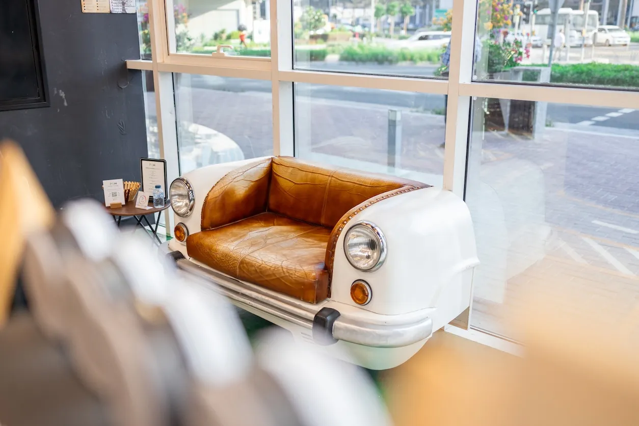 The signature vintage-car seating lounge at Project Hairway
