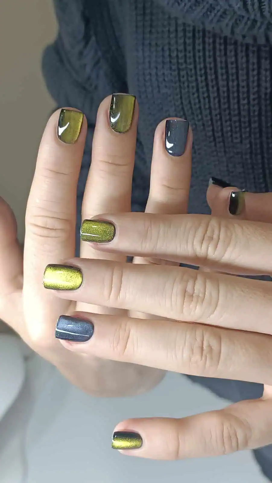 Olive and graphite cat-eye manicure